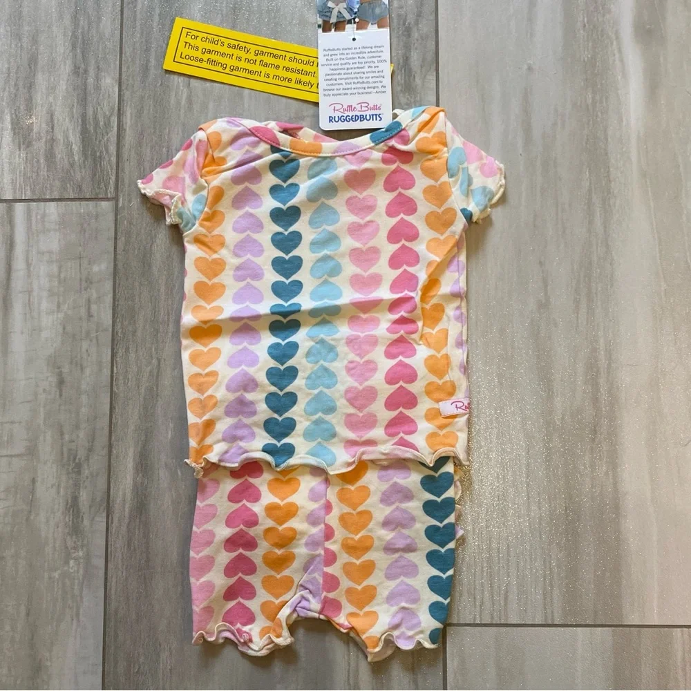 NWT RuffleButts Rainbow Heart Snuggly 2-Piece Ruffled Short Sleeve Pajamas, 0-3M